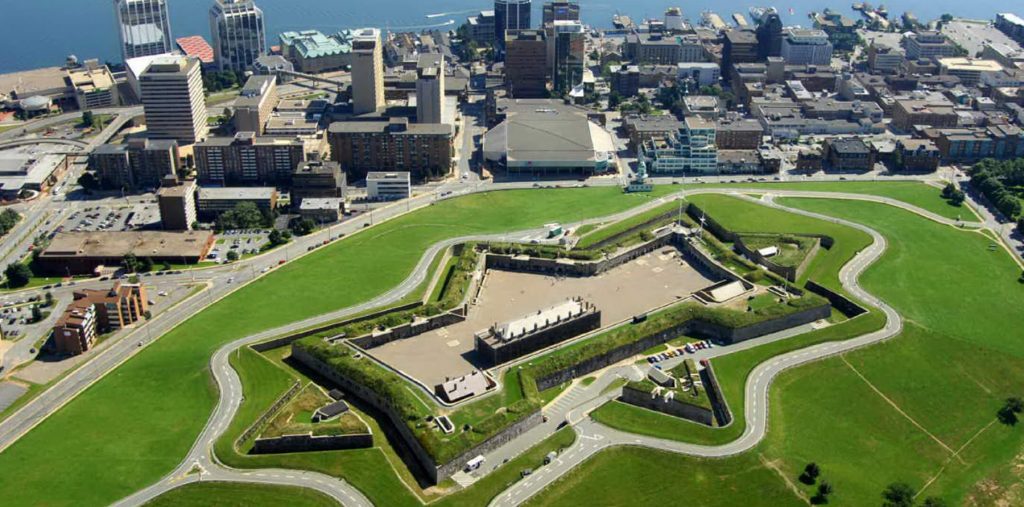 A star shaped citadel sits atop a green hill in the middle of downtown Halifax